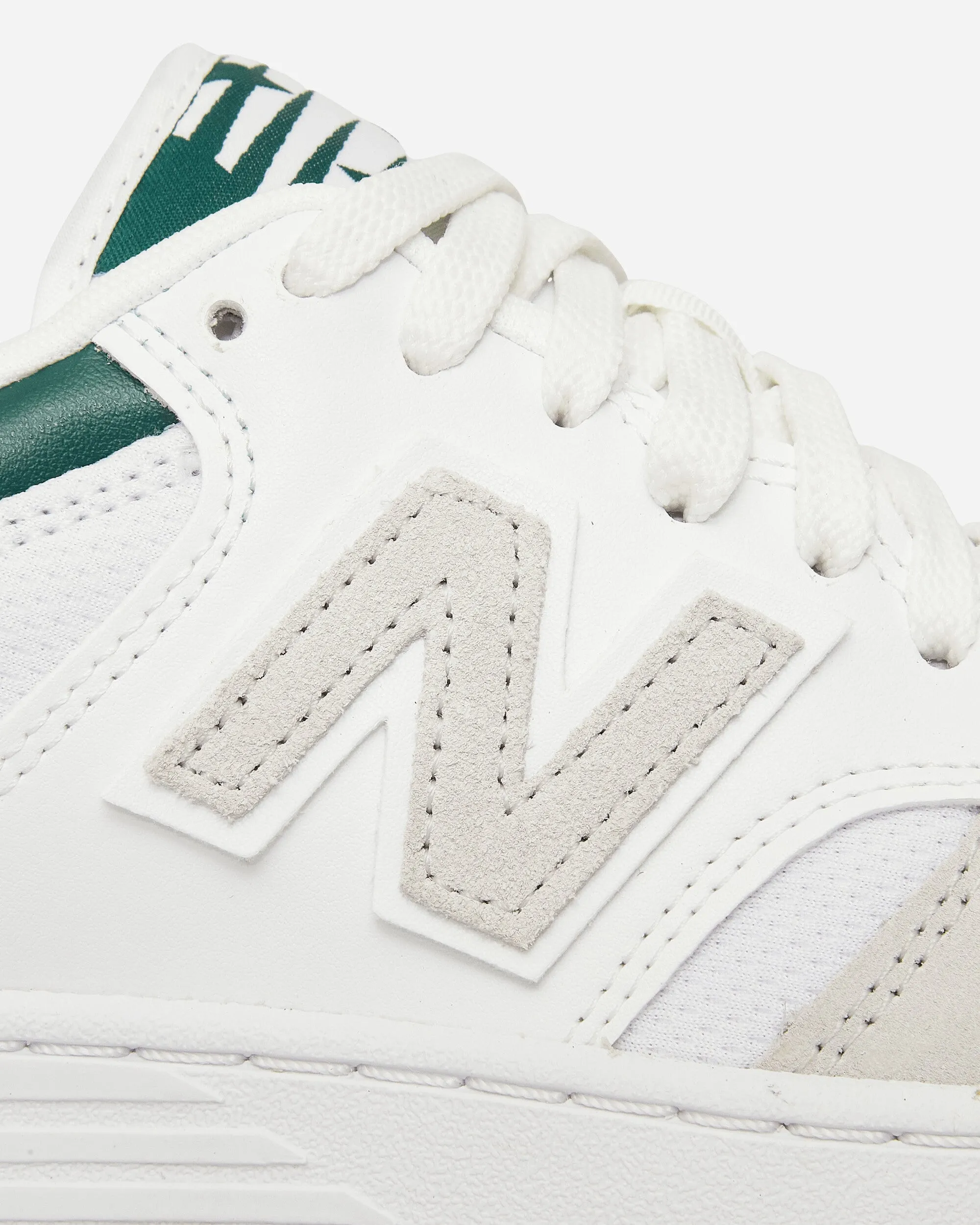 Stylish White and Night Watch Green Sneakers, Size 480