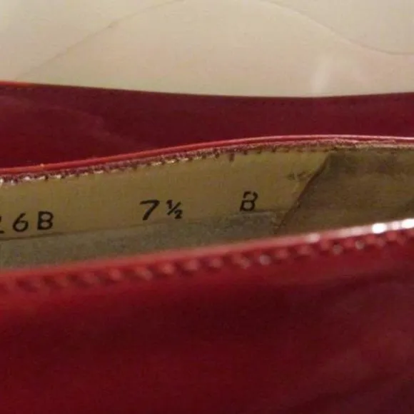 Salvatore Ferragamo Red Patent Leather Flats With An Extra Large Vara Accent